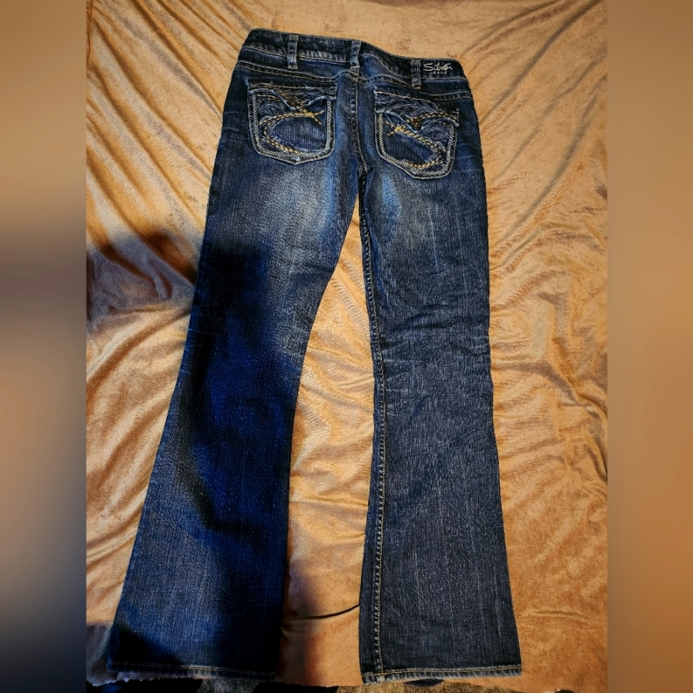 31/33 woman's silver jeans